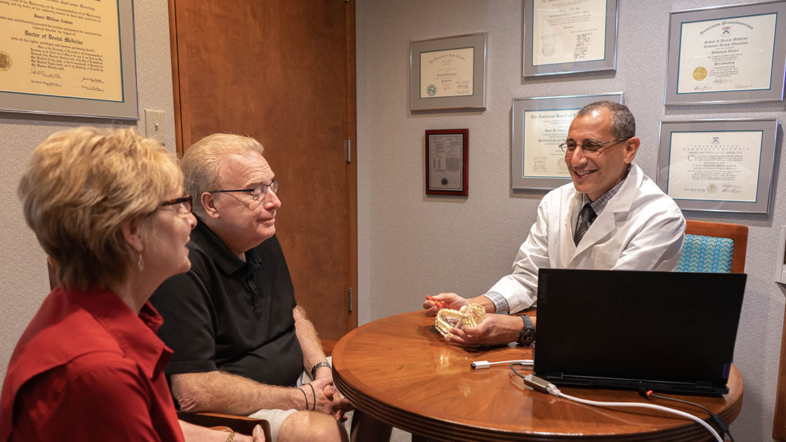 Dr. Elazizi talking with patient
